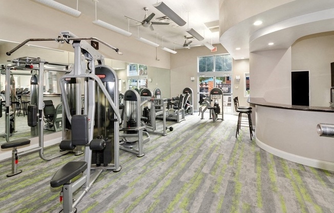 Fitness Center with weight machines and carpeted floors