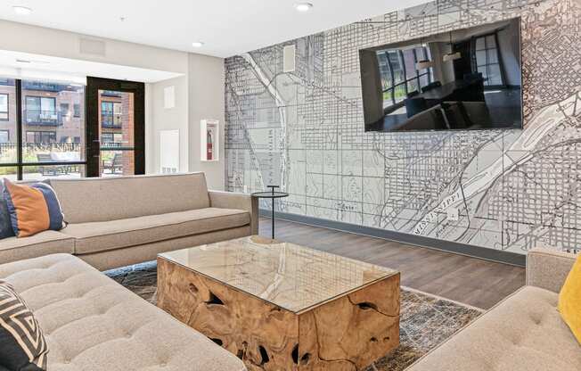 a living room with couches and a table