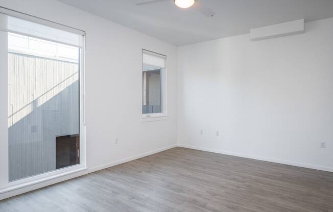 The Lenox | Living Room Area with Large Windows