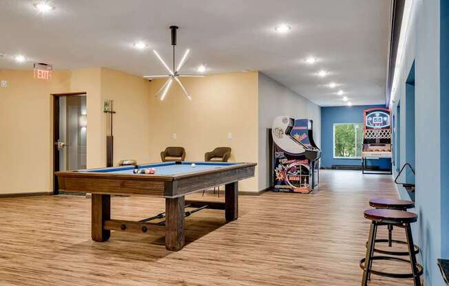 a game room with a pool table. Circle Pines, MN Lexington Lofts