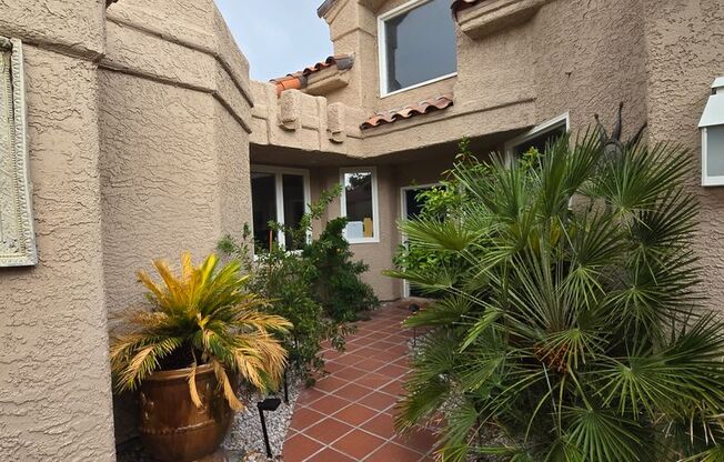 STUNNING GOLF COURSE AND WATER VIEWS IN GUARD-GATED SPANISH TRAIL!