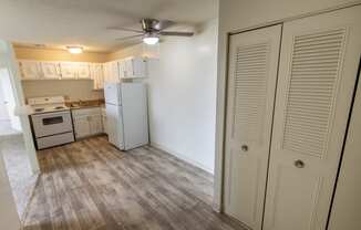 This is a photo of the kitchen and entryway closet in the 545 square foot 1 bedroom, 1 bath apartment at Lisa Ridge Apartments in the Westwood neighborhood of Cincinnati, Ohio.