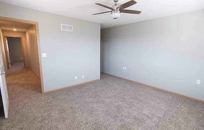 Large bedroom with lots of natural lighting at Cascade Pines Town-homes Lincoln Nebraska