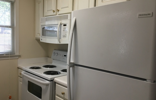 ONE LEVEL CONDO NEAR REX HOSPITAL -Fireplace * Home Owner's Association