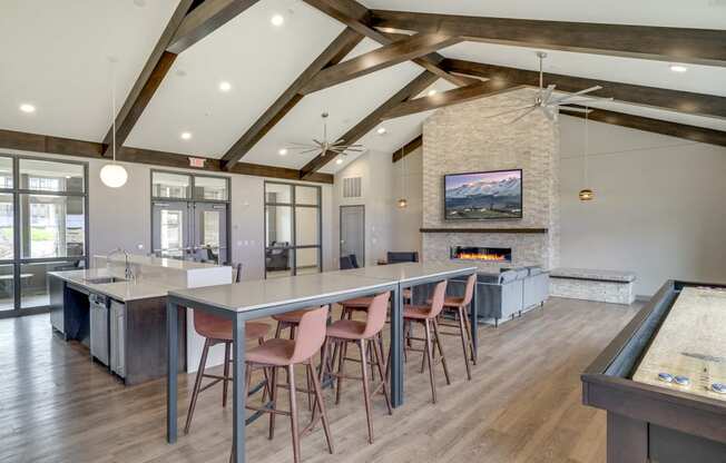 Clubhouse with seating, TV lounge and kitchen at Ascend at Woodbury MN 55129 new luxury apartments