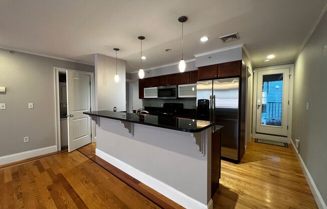 Southie 2 bed with a heated garage parking space!