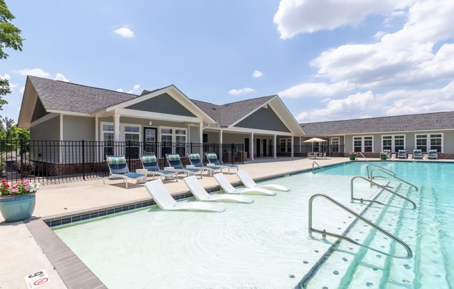 our apartments have a large resort style pool with lounge chairs