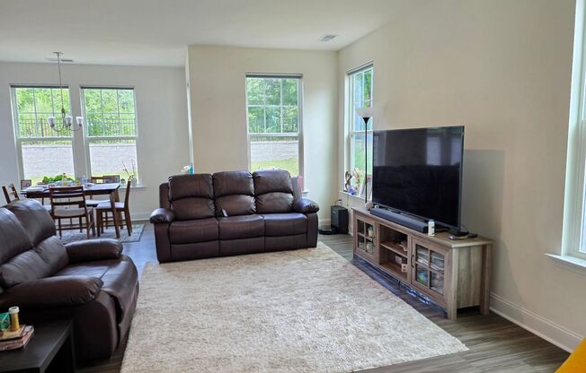 Centrally located, brand new 3-bedroom, 2.5-bathroom w/ Lawncare included
