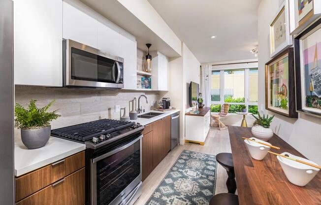 Gourmet kitchen with premium quartz surfaces and sleek appliances for inspired cooking.