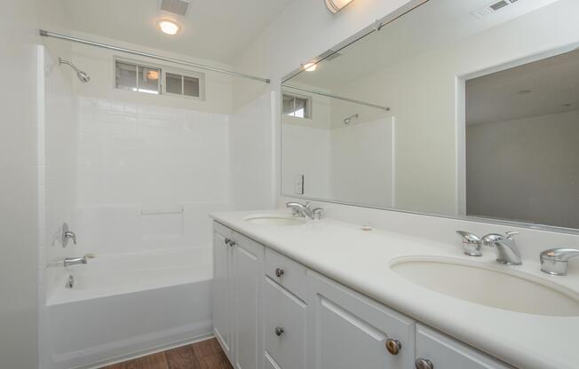 Unfurnished bathroom with two sinks