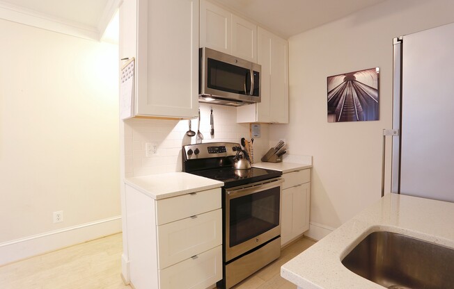 Parking Available! 1 Bedroom 1 Bathroom Corner Unit Condo// Columbia Heights // In Unit Laundry // Easy Walk to Metro!