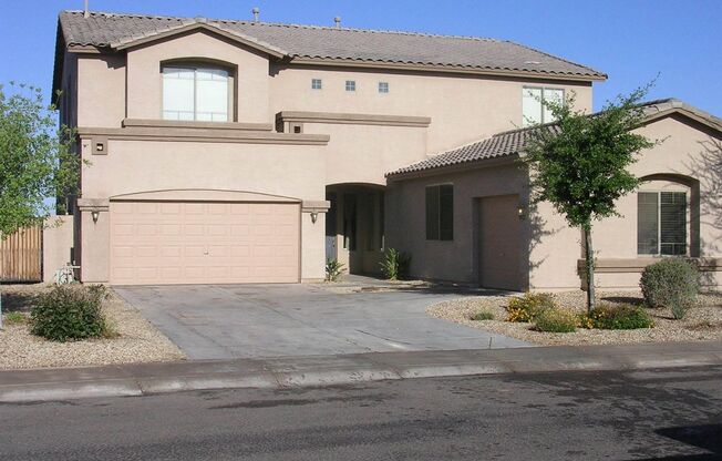 Large 6 Bed 3 Bath 3 Car Garage Home with RV Gate + Den + Loft in Avondale