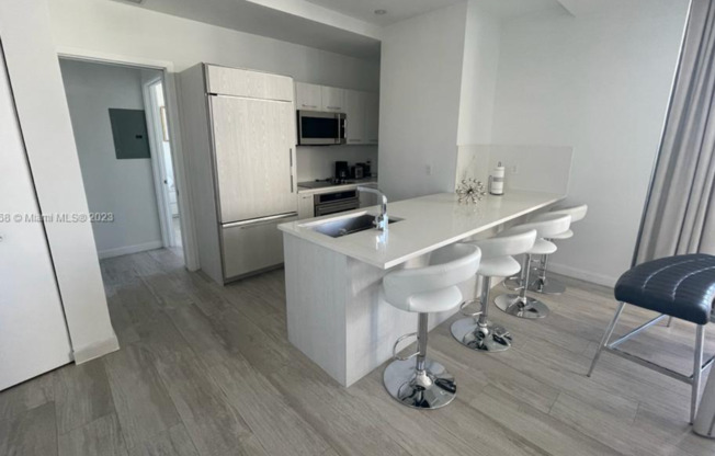 Remarks:	Enjoy stunning Skyline and Bay views from the wraparound balcony of this furnished 2-bedroom, 2-bathroom corner unit for rent at Brickell Heights.