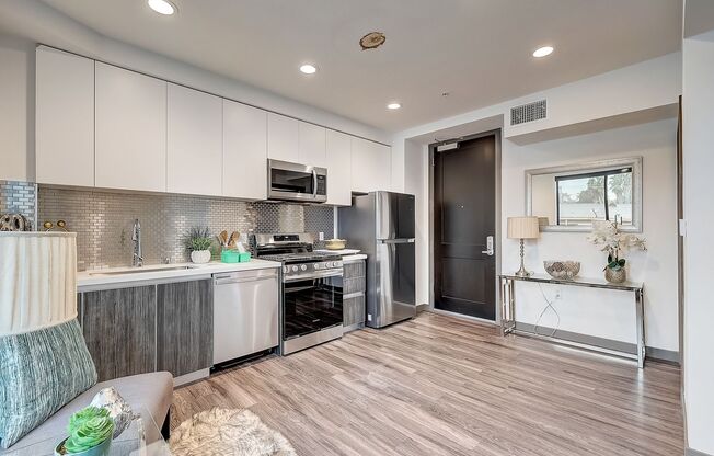 Brand New Building featuring 1 & 2 bedroom Flats & Townhomes!