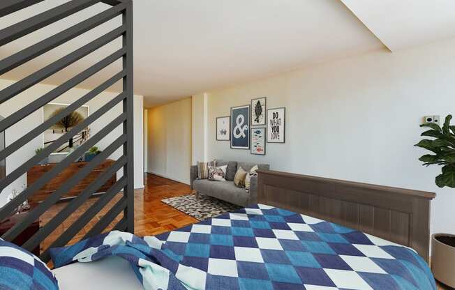 studio apartments showing bed, sofa and front entrance at brunswick house apartments in dupont circle washington dc