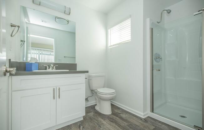 a room with a sink and a mirror