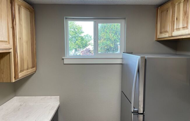 Brand new remodel - top floor 2 bedroom with deck and parking