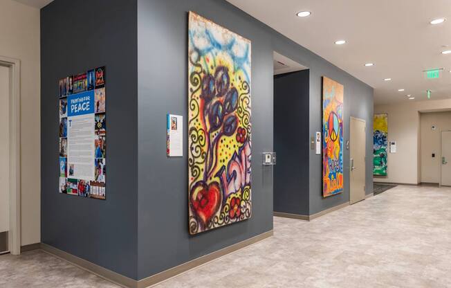 A hallway with a poster on the wall that says "peace".