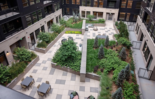 Well-manicured outdoor courtyard with social seating