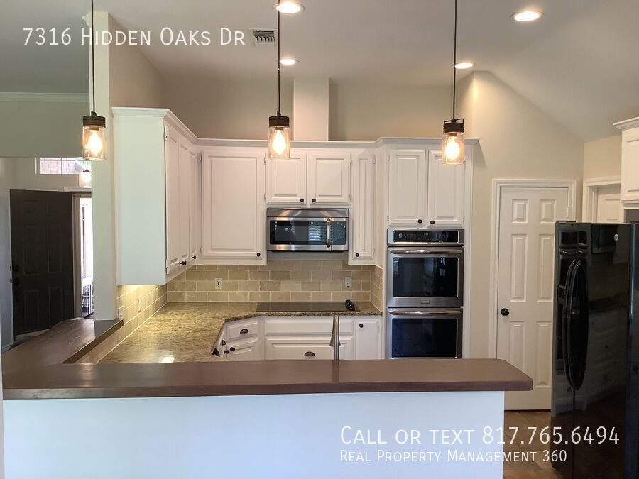7316 HIDDEN OAKS DR