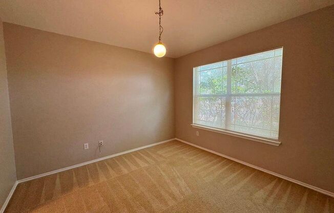 126 Salado Dr in Kyle is a charming single-story brick home nestled in the Silverado at Plum Creek community!