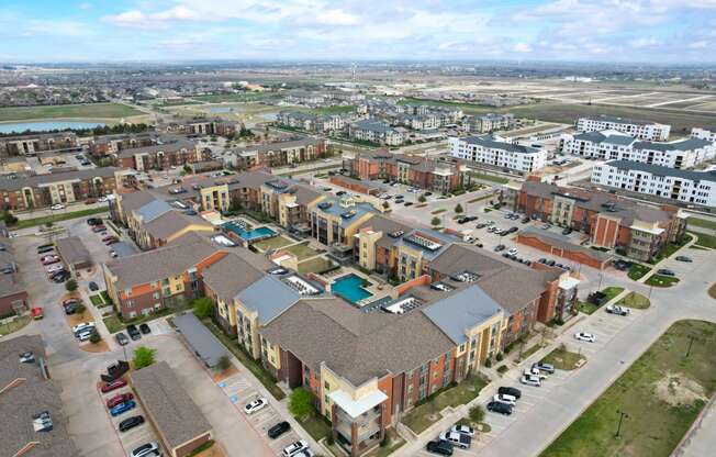 an aerial view of a housing development in a city