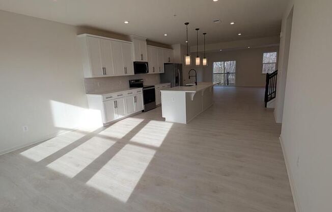 First time rental of this newly built spacious property, with over 2,400 square feet of interior space, one car garage, open floor plan.