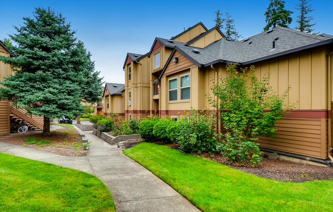 Apartments in Happy Valley OR - Exterior View of the Expansive Community at Sunnyside Village Featuring Beautiful Green Landscaping