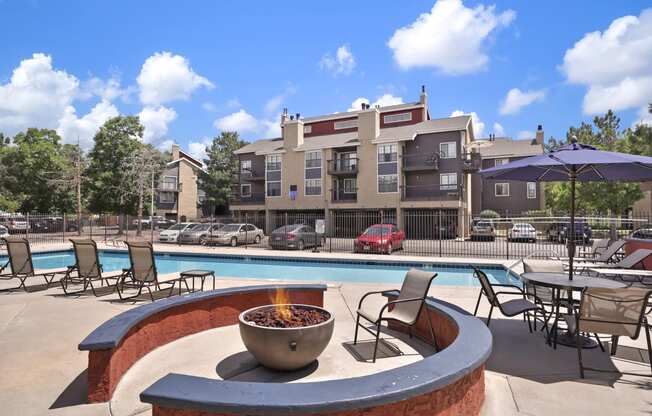 our apartments offer a swimming pool with a fire pit