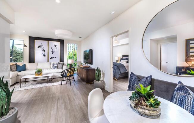 Dining and lounge space offering easy access to the outdoor balcony.