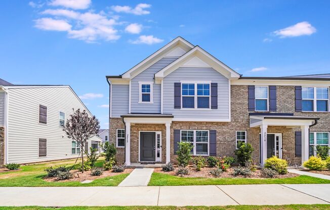 Brand-New End Unit Townhome in Riverstone – Designer Finishes & Future Resort-Style Amenities