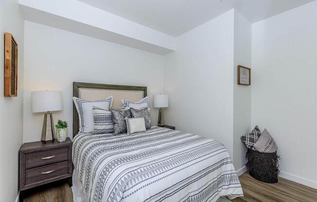 a bedroom with a bed and two night stands at Jefferson Yards, Washington