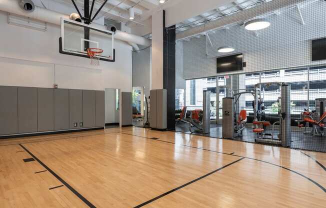 indoor basketball court in fitness center at Sky on Main Apartments in Kansas City, MO