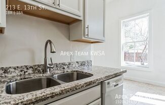 213 E 13 ST