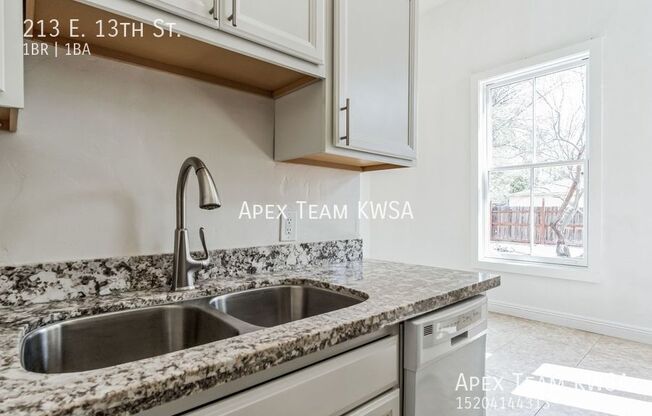 213 E 13 ST