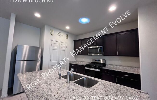 11128 W BLOCH RD