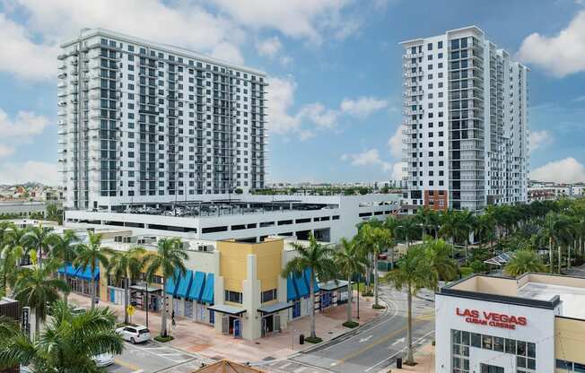 Two tall buildings are in the background of a Las Vegas sign. at Palma, Doral, FL, 33166