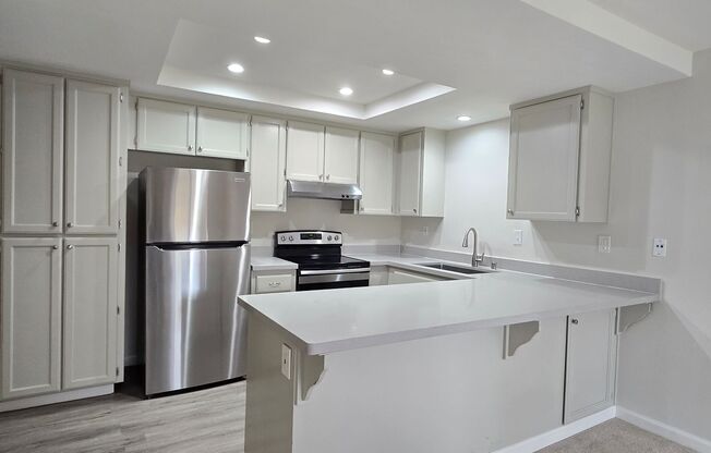 Remodeled Single Family Home, Newer Kitchen/Bathrooms, Fresh Paint, Large Yard with Pie Shape Lot!