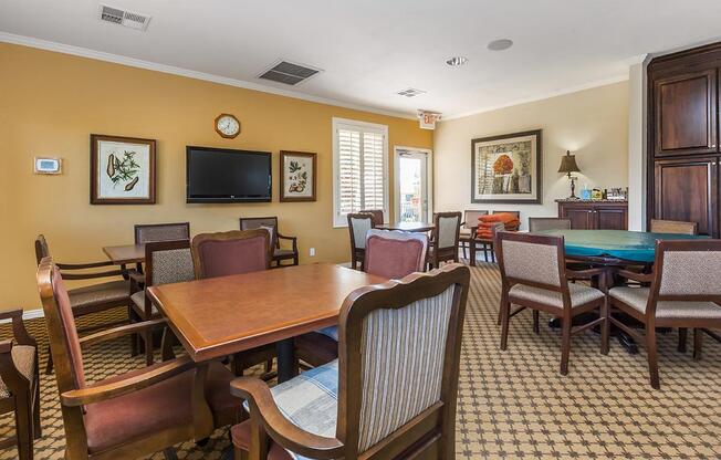 a living room filled with furniture and a table