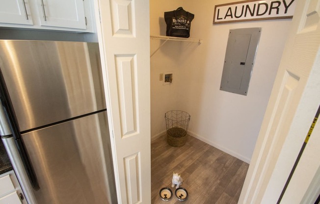 This is a photo of the laundry closet with washer and dryer connections of the 1100 square foot 2 bedroom Kettering floor plan at Washington Park Apartments in Centerville, OH.