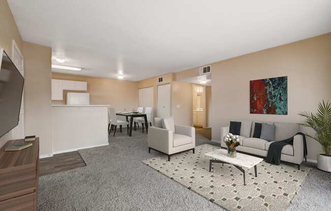 A living room with a grey carpet and a white sofa.