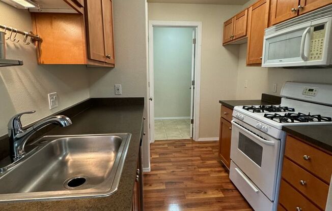 15320 NW Central Drive #326 ~ Impressive Bethany Village Condo!
