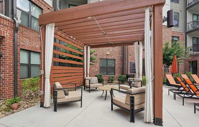 Pool cabanas with chairs