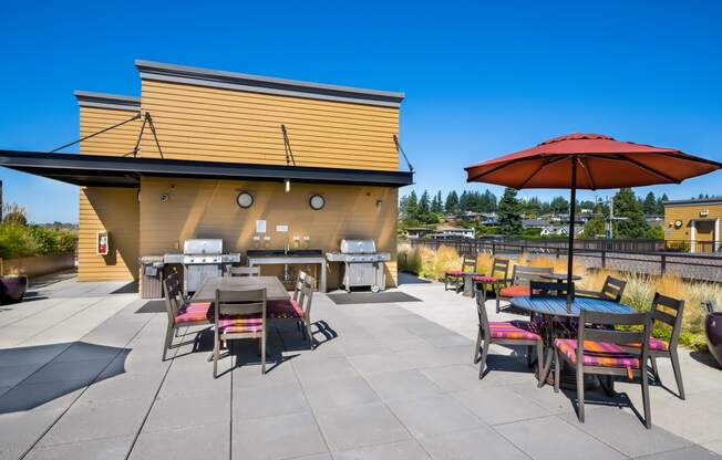 Lux Apartments Rooftop Patio with Grills