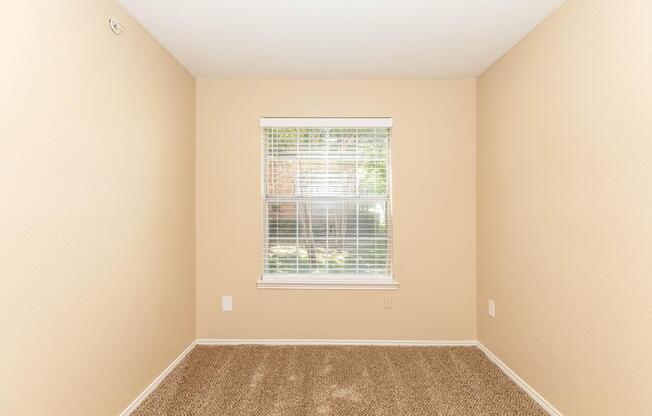 a room with a sink and a window