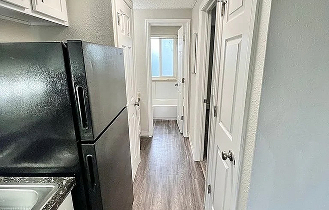 Explore this inviting hallway that combines modern design with functional elegance.