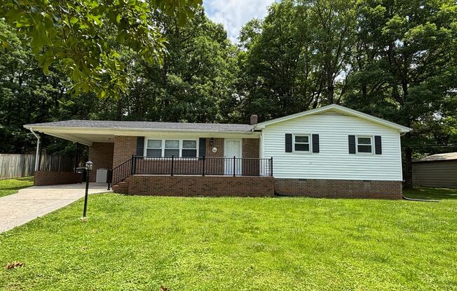 Nice brick home, single carport, storage building, 3 bdrm 1.5 ba