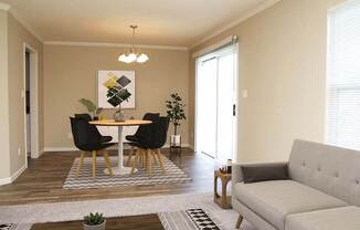 a living room with a table and a couch