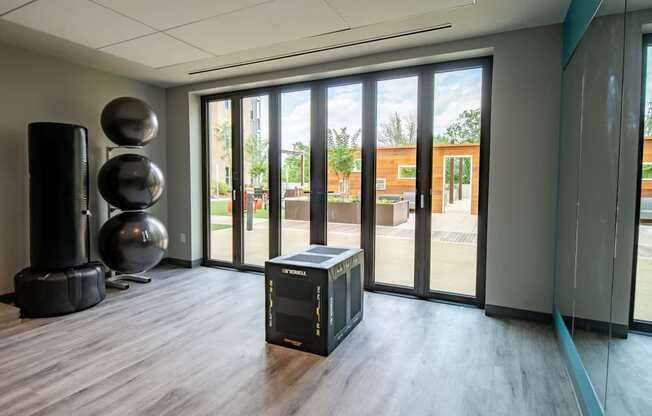 a large room with a large window and a cpu on the floor