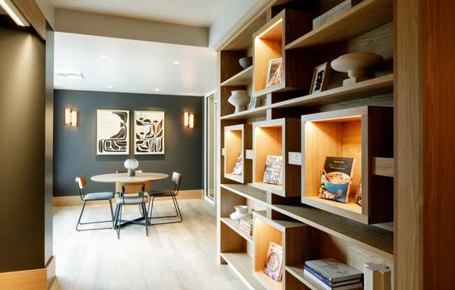 Library cubbies with books and decor highlighted at Slabtown Square Apartments, Portland